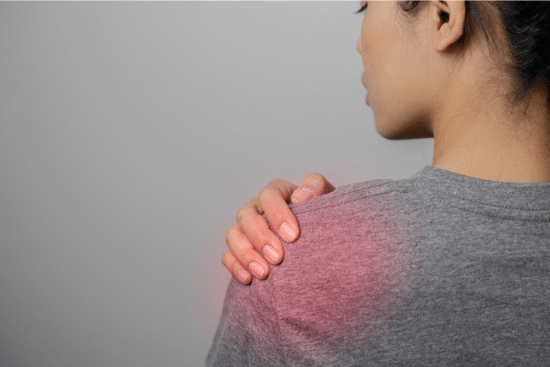 Woman with shoulder pain, muscle soreness